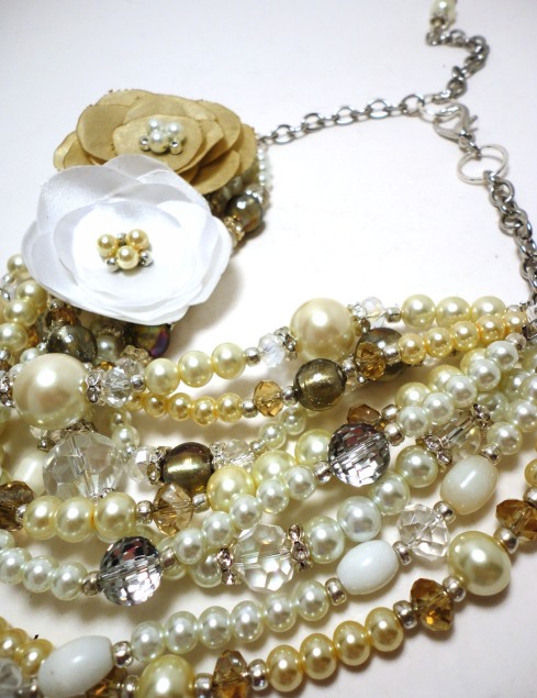 It was a deep ivory with lots of white gold and ivory beads all over